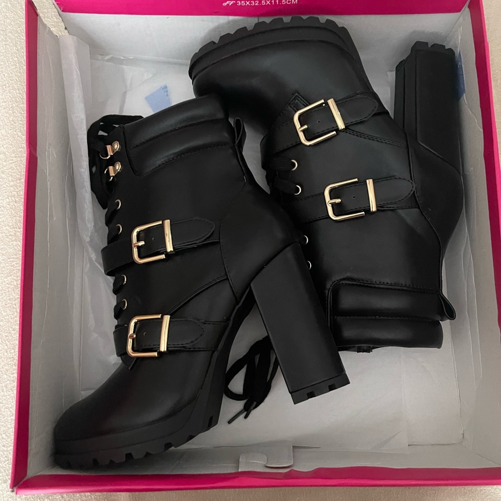 Black buckle boots